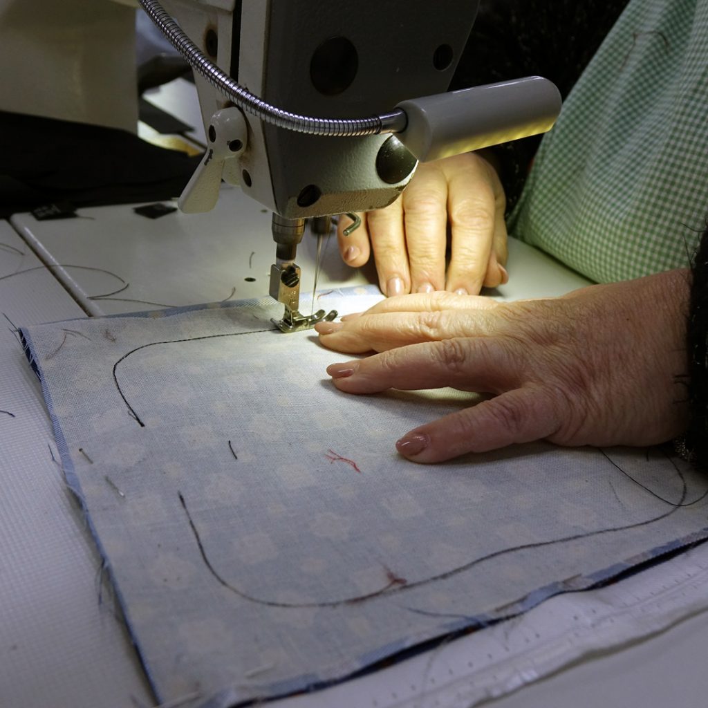 A processing phase of the DM Ties glasses holder: the arrangement of the internal core in raw cotton