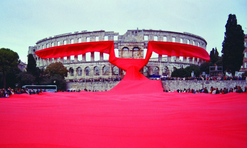 Oct. 18, 2003, Croatia: the Academia Cravatica wrapped a giant red tie around the Roman arena in Pula to pay homage to the symbol of the country's national identity. 