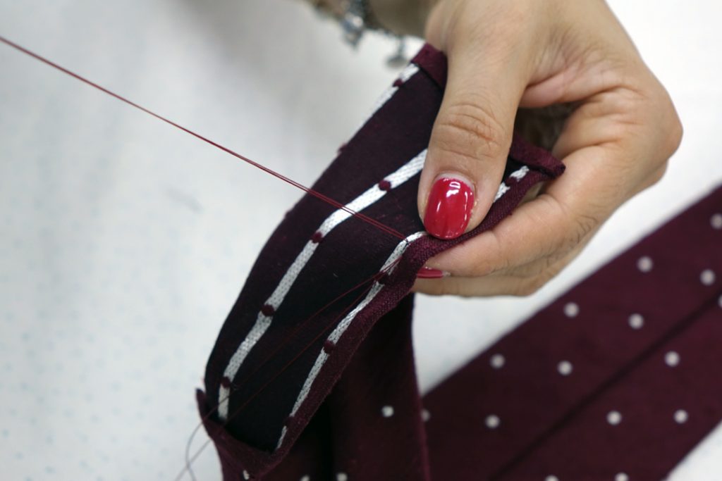 Hemming stage of a DM Ties tie